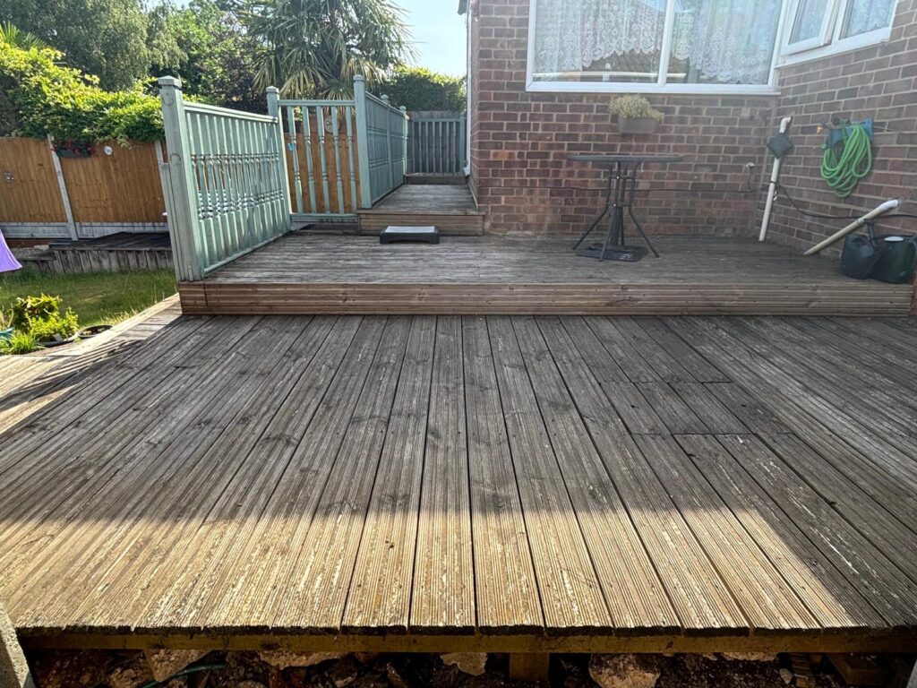 Worn wooden deck in need of replacement – garden makeover project